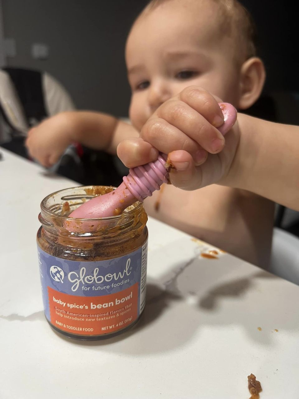 Nurturing Development Through Spoon Feeding and Playtime